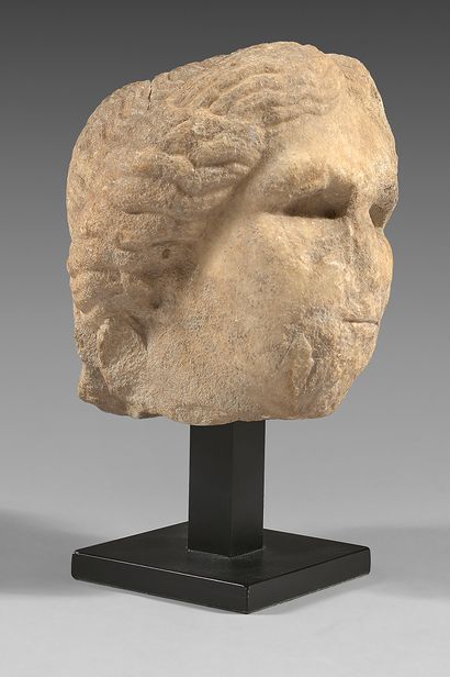 Head of a woman with fine wavy hair. Marble....