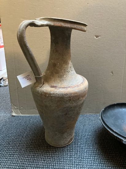 null Lot including a lekanis cup (handle and lid lost) and a large jug with a truncated...