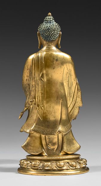 TRAVAIL SINO-TIBETAIN Statuette en bronze doré et traces de polychromie, de bouddha...