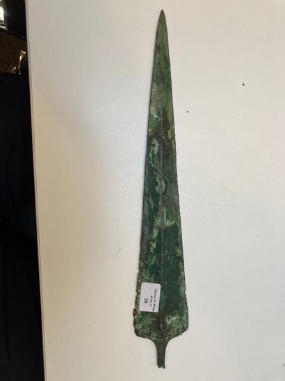 null Dagger with triangular blade and curved tang.
Copper alloy
Cyprus (?), Late...