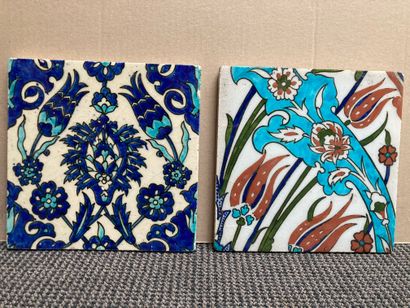 null 
IZNIK 

Nine ceramic wall tiles with polychrome painted decorations of various...