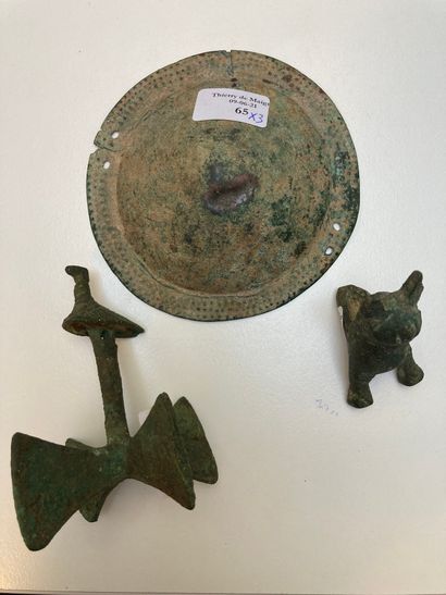 Lot including a small umbo ?, a foot of a...