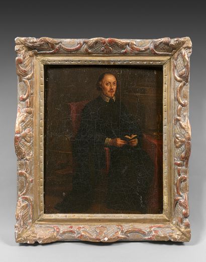 École FLAMANDE vers 1650 
Portrait d'homme en noir portant un livre
Panneau. Restaurations...