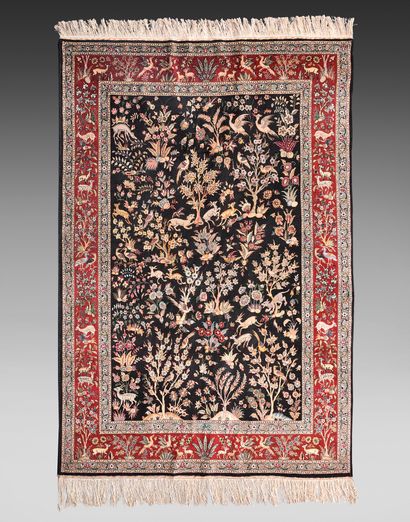 null Carpet with floral and animal decoration, red border decorated with different...