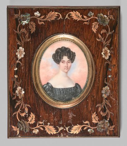 Ecole Francaise vers 1840 
Portrait of a young woman against a background of pink...