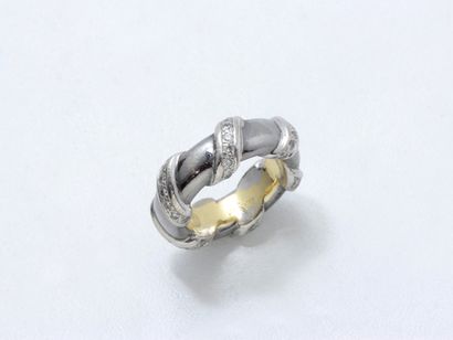 null VERNEY. Ring in rhodium-plated gold 750 thousandths, with decoration of winding,...