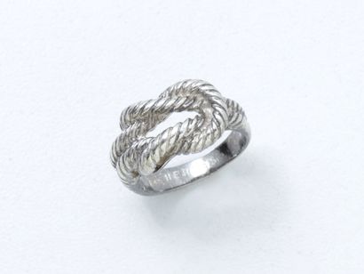 null HERMÈS. Bague en argent 800 millièmes, à décor de noeud plat torsadé. Signée....