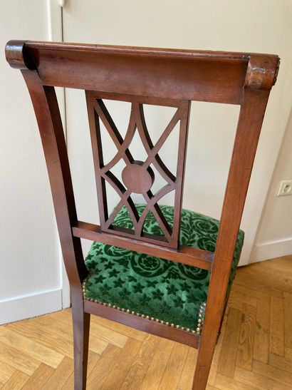 null 
Mahogany and mahogany veneer openwork chair, later sabre legs, green velvet...