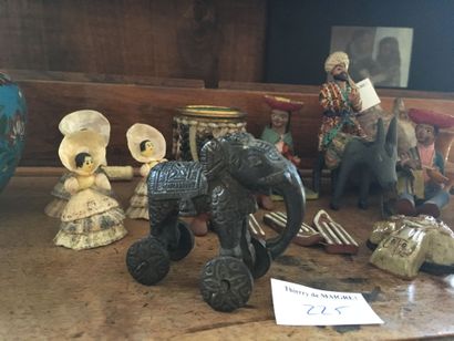 null 
UNSOLD Lot: souvenirs, terracotta vase, figurines, statuette of elephant on...