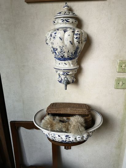 null Fountain and its basin in earthenware decorated in blue and white with Chinese...