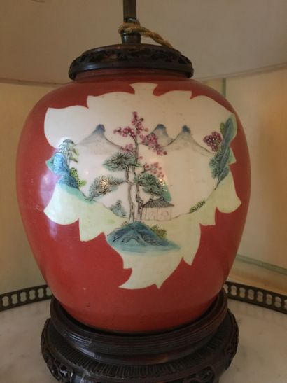 null CHINA. Ginger pot with red background decorated in reserves with birds in landscapes....