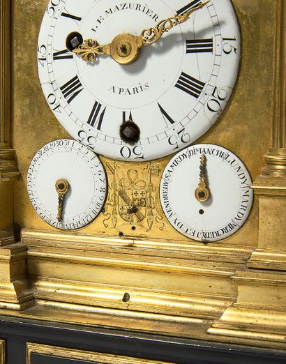 null Rare gilt bronze or copper chased clock. Of architectural form, the cover with...