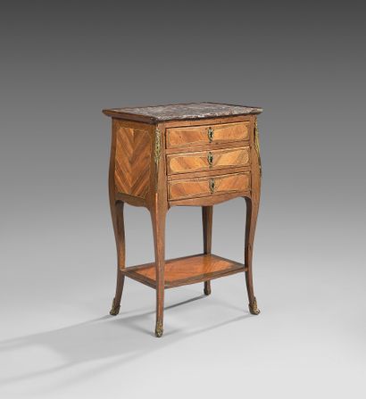 null Table called "chiffonnière" inlaid with rosewood in frames of amaranth; it has...