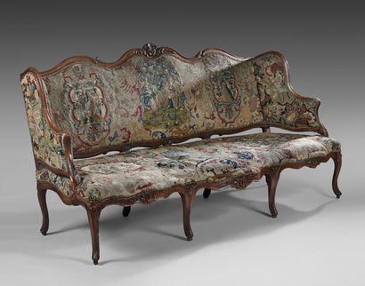 null Sofa with triple evolution in molded and carved beech wood decorated with large...