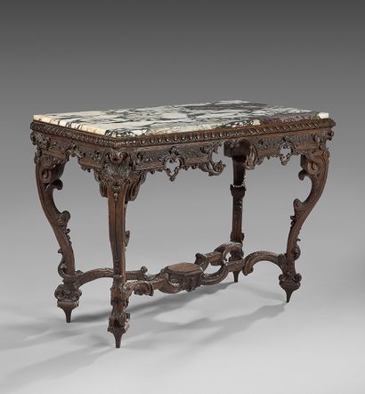 A rare moulded and carved oak console table...