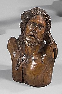 null Bust of Christ in carved wood. Head tilted on the shoulder Head turning slightly...