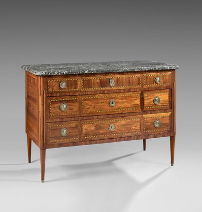null Chest of drawers inlaid with rosewood in frames of the same species underlined...