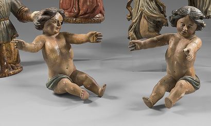 null Pair of cherubs sculpted in the round with polychrome lacquer.
They are chubby...
