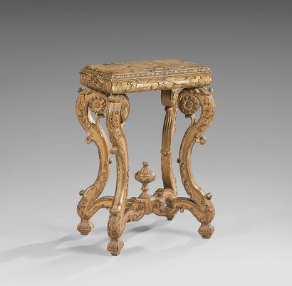 Small carved and gilded oak middle table;...