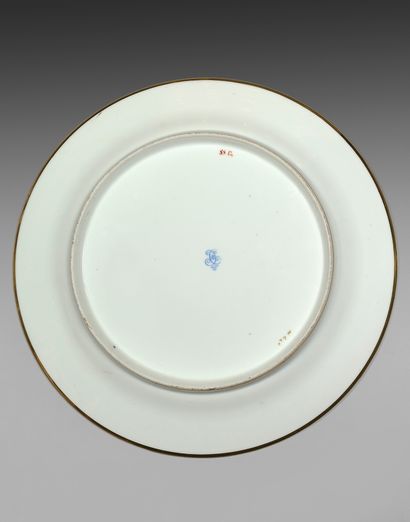  Service en porcelaine de Sèvres du XIXe siècle. Marques en bleu aux deux C entrelacés...