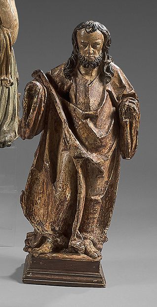 Apostle in carved walnut, polychrome. The...