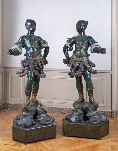Pair of carved, lacquered and painted Nubians...