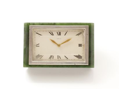 null CARTIER. Desk clock to be placed on an easel or as a paperweight. Silvered dial...