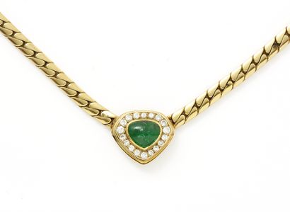 null Necklace articulated in gold 750 thousandths centered of a motive of heart in...
