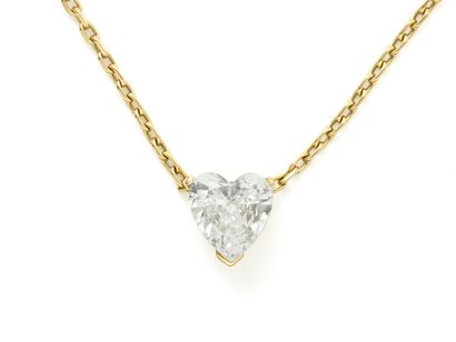 null Pendant necklace in gold 750 thousandth retaining a diamond heart in claw setting....
