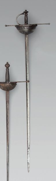 null Sword with taza, wrought iron guard, chased and pierced shell with dragons and...