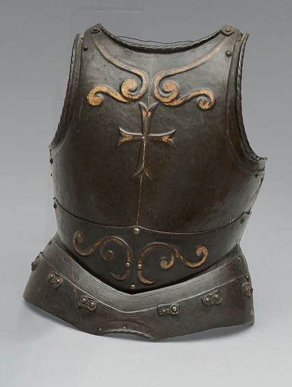 null Wrought iron knight's breastplate, burnished, with gilded embossed motifs representing...