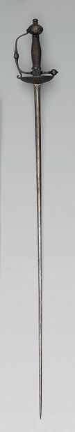 null Small town sword, wrought or cast and burnished iron hilt, decorated with braidings...