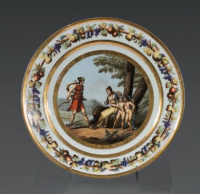null A Paris porcelain plate, white and gold, decorated in the center with a mythological...
