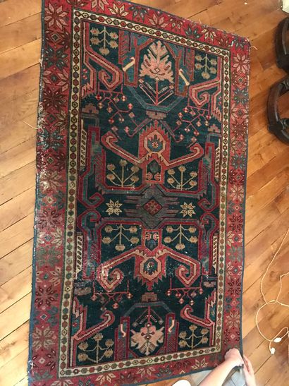 Small Caucasian carpet, blue background (stains,...