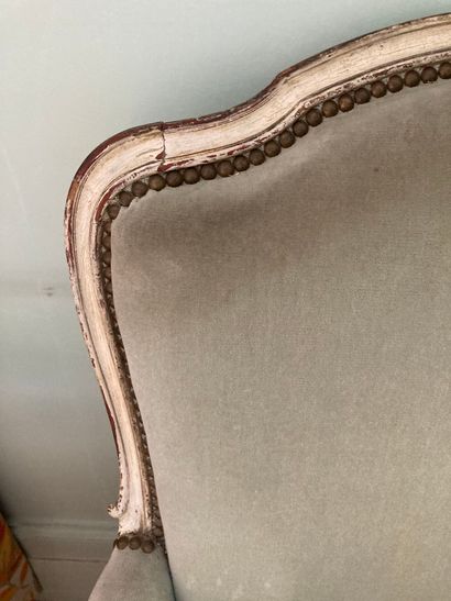 null Lot including : a Louis XV style lacquered armchair with almond velvet upholstery...