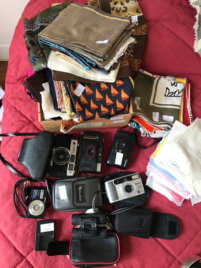 null Lot of various scarves, cameras and binoculars

Lot sold as is