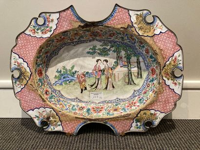 null Oval poly-lobed beard or pipe dish enamelled on copper, with characters in a...