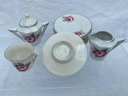 null Paris porcelain dinner set with polychrome decoration of small flowers

including...