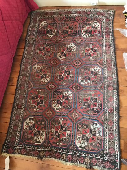 null Lot of three very worn carpets including a gallery, a cut fragment and a blue...