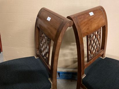 null A pair of mahogany and mahogany veneer chairs ; the backs inverted with scrolls...