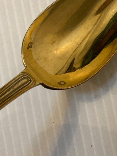  12 small spoons in vermeil 
314g 
Lot sold as is