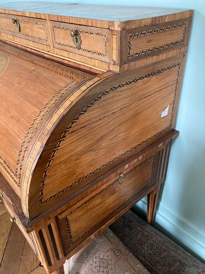 null A veneered cylinder desk decorated with music trophies

Eastern work, Louis...