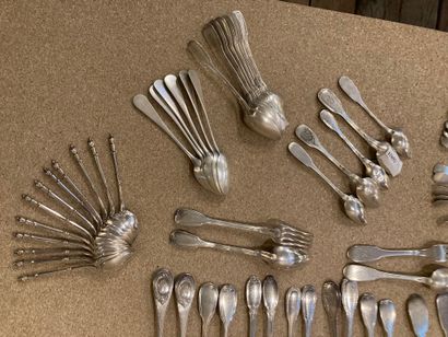 null 
7 cutlery items + 54 small spoons + 8 dessert cutlery items + 1 grape scissors...