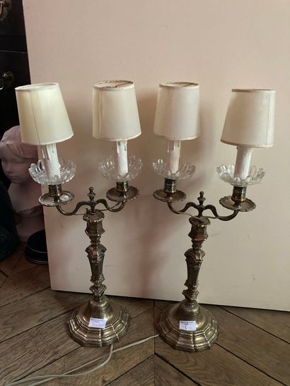  Pair of silver plated candelabras 
Regency style 
Height : 37 cm 
Sold as is, with...