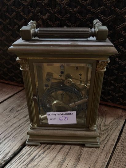 null Travelling clock, circa 1900

H : 16 cm

Lot sold as is, wear and tear