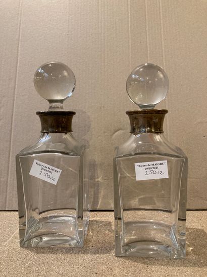 Two crystal decanters with silver plated...