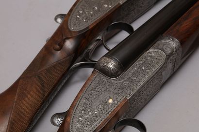 null Pair of Holland & Holland rifles mod. Royal Hammerless. Ejector calibre 12.65...