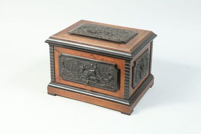 null 
P. Sormani. Cigar cabinet in oak and wood plates with hunting decoration, boar...