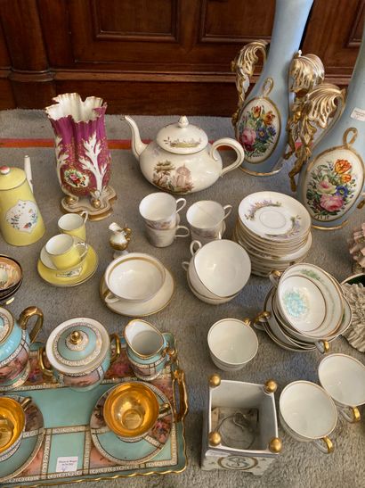 null Porcelain lot including different parts of tea and coffee service, vases, pourers,...