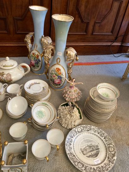 null Porcelain lot including different parts of tea and coffee service, vases, pourers,...